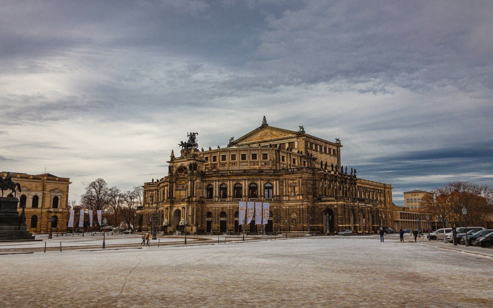 Semperoper opera house in Dresden, with a snow-dusted square in front